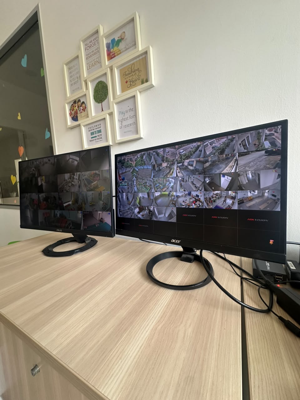 Live CCTV monitoring screens showing multiple camera feeds around the centre
